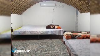 نمای داخلی اتاق رز اقامتگاه بوم گردی نخلستان کویر - شهداد - روستای دولت آباد